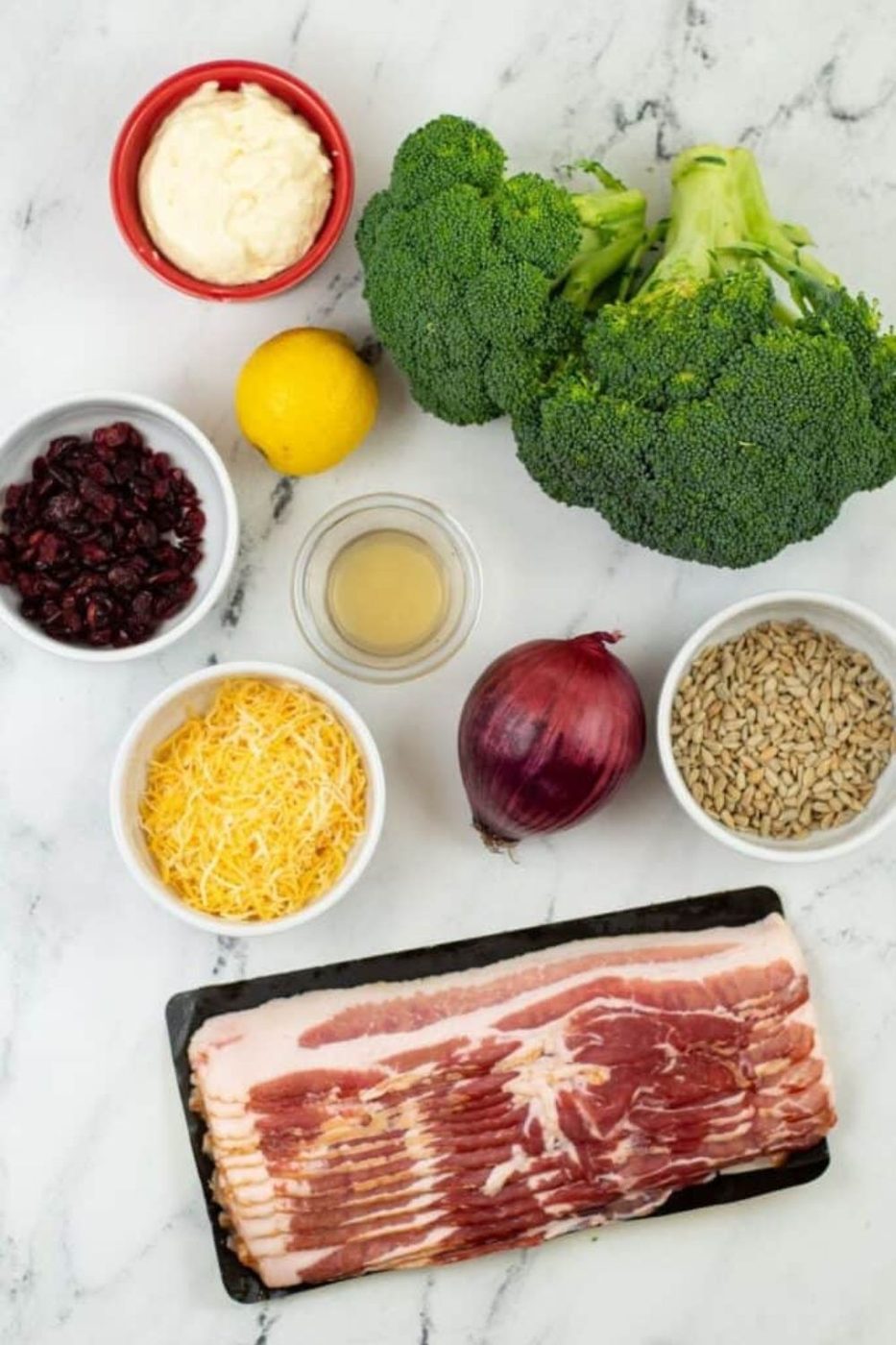 ingredients for making Amish Broccoli Salad on table 