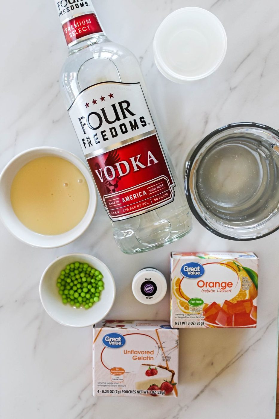 ingredients for jello shots on marble table