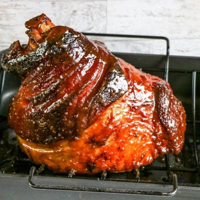 glazed ham in roasting pan