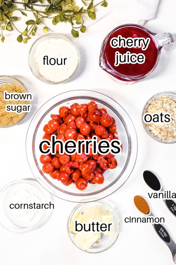ingredients for cherry crisp on table in bowls 