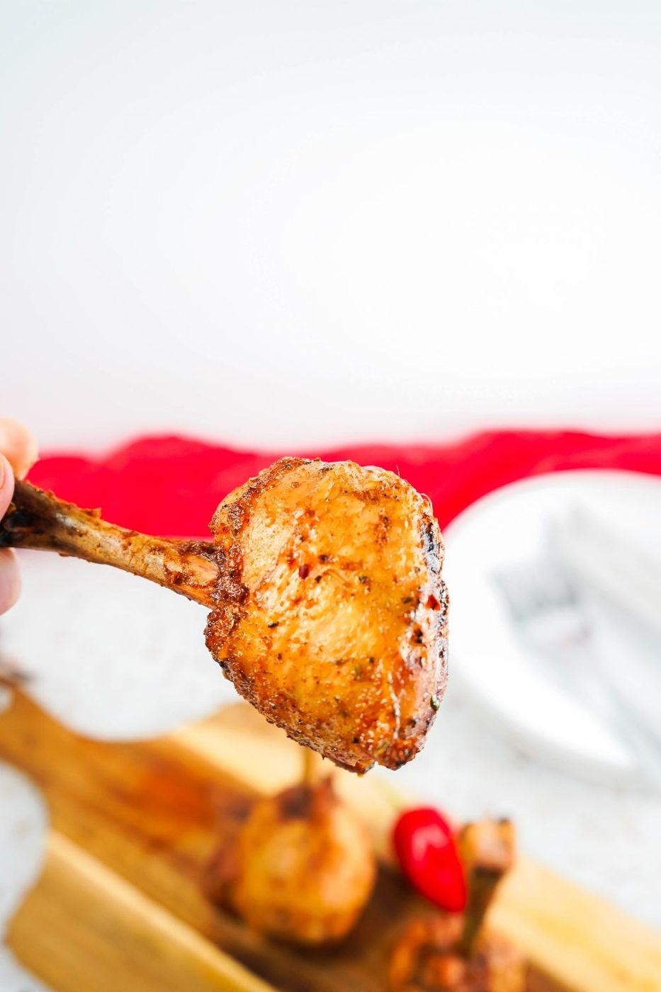 chicken leg pop in hand 