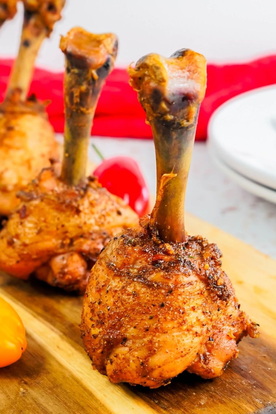 drumstick lollipop on wooden cutting board 
