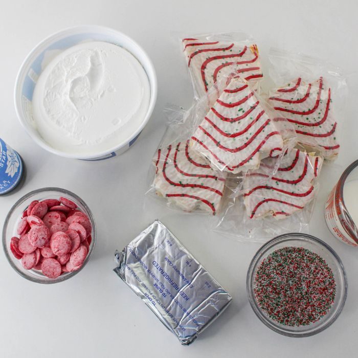 ingredients or Christmas tree dip on white table 