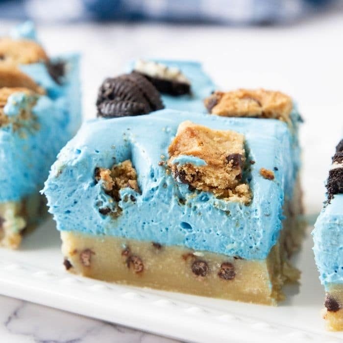 cheesecake bars on a white tray