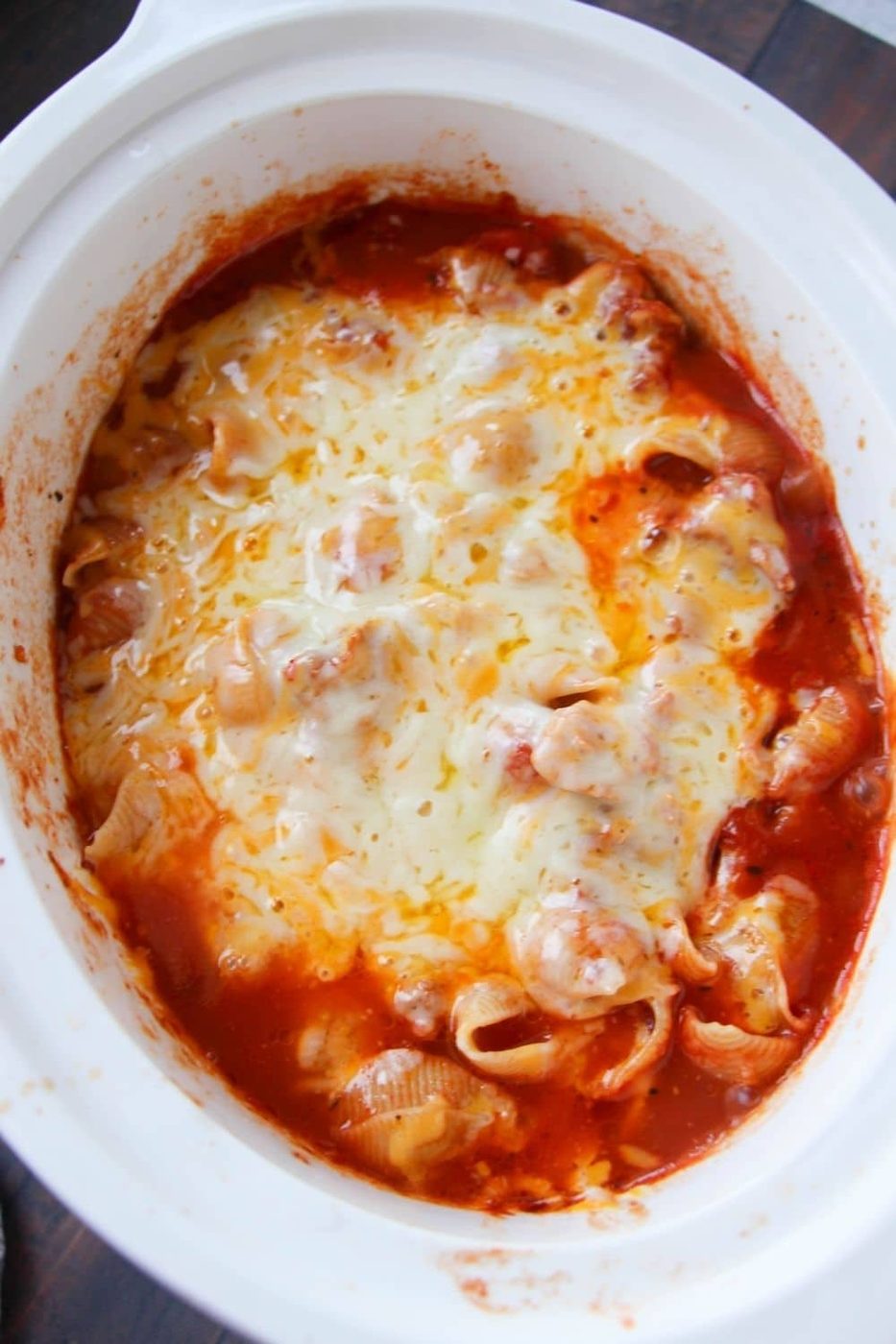 overhead shot of chicken parmesan pasta in crockpot