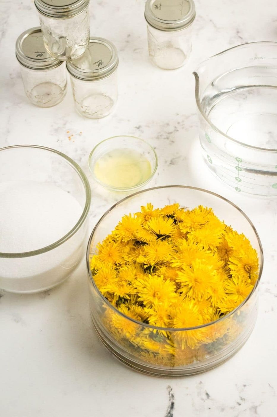 ingredients for dandelion jelly on table 