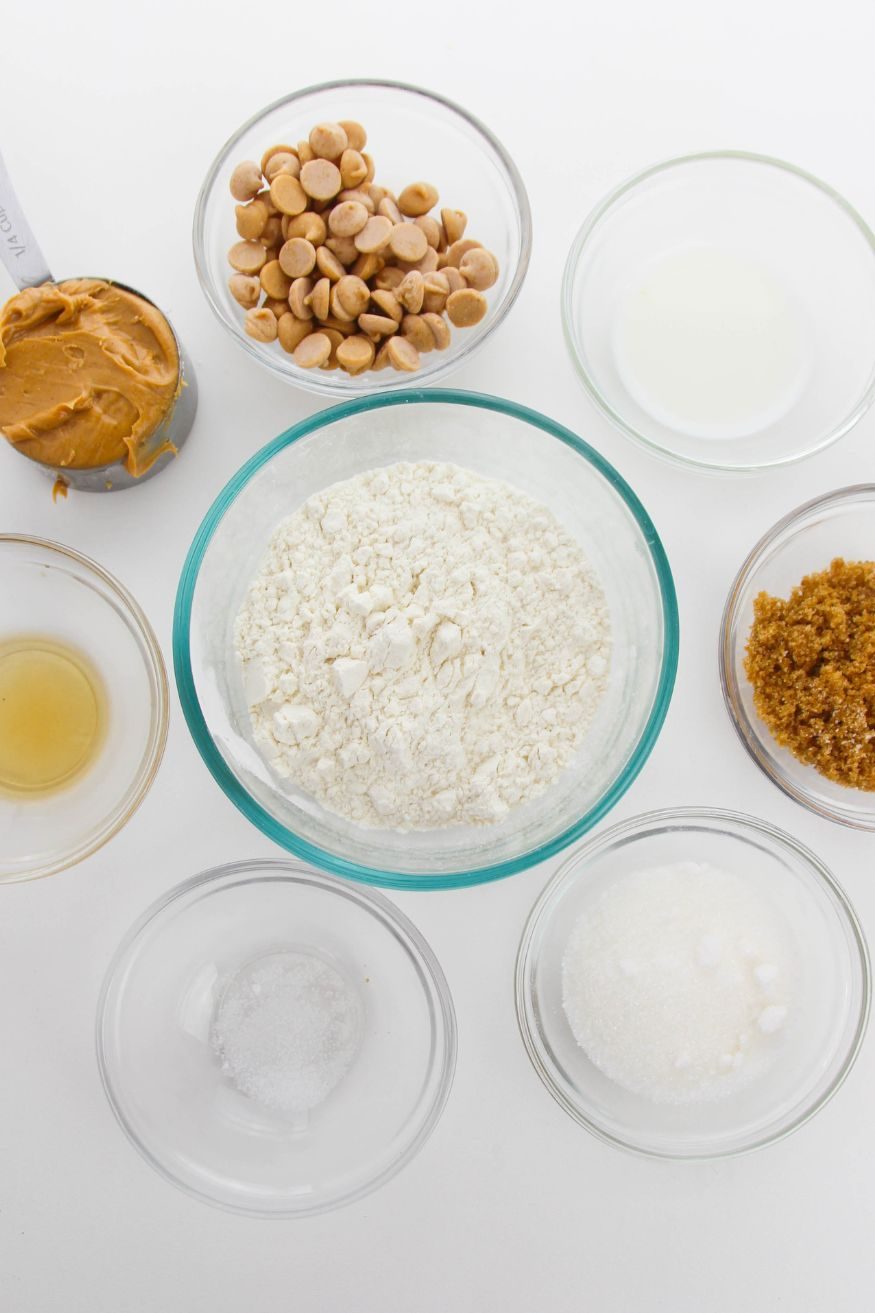 overhead view of peanut butter cookie dough ingredients on a table 