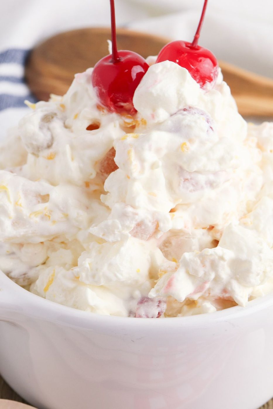 fruit cocktail marshmallow salad in a white bowl 