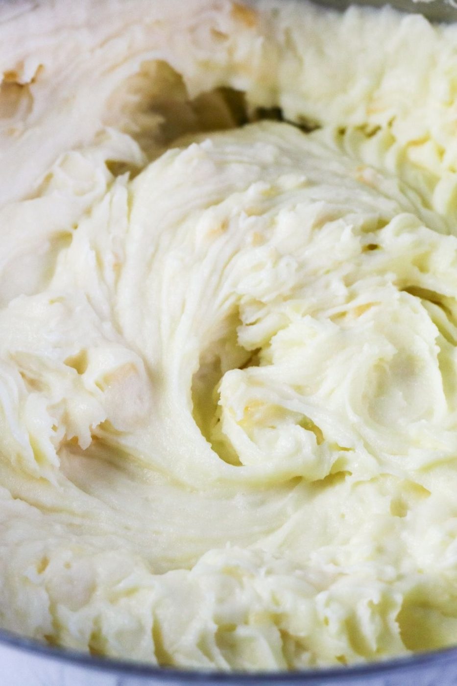 creamy mashed potatoes in a pan 