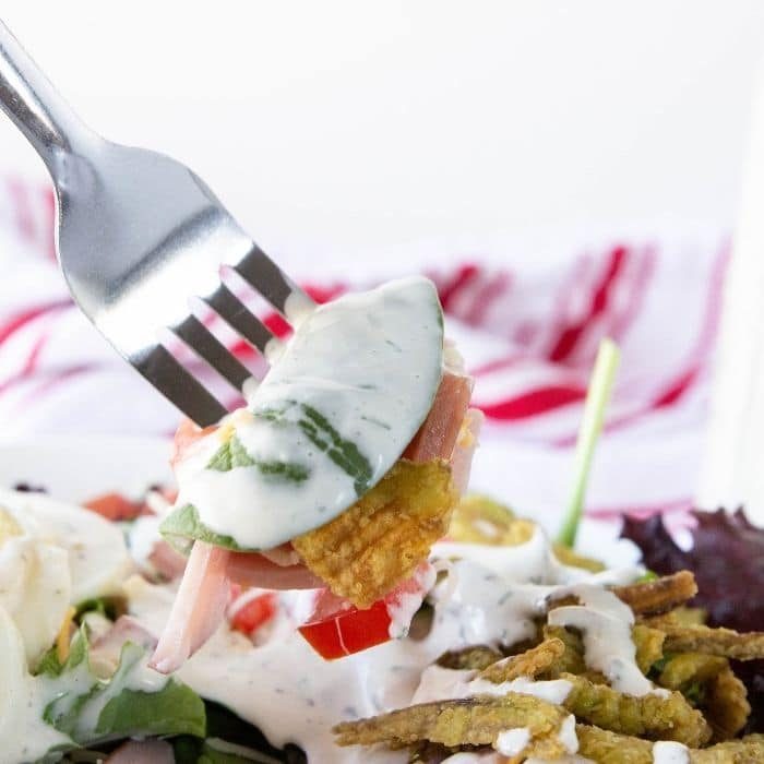 fork with salad on it 