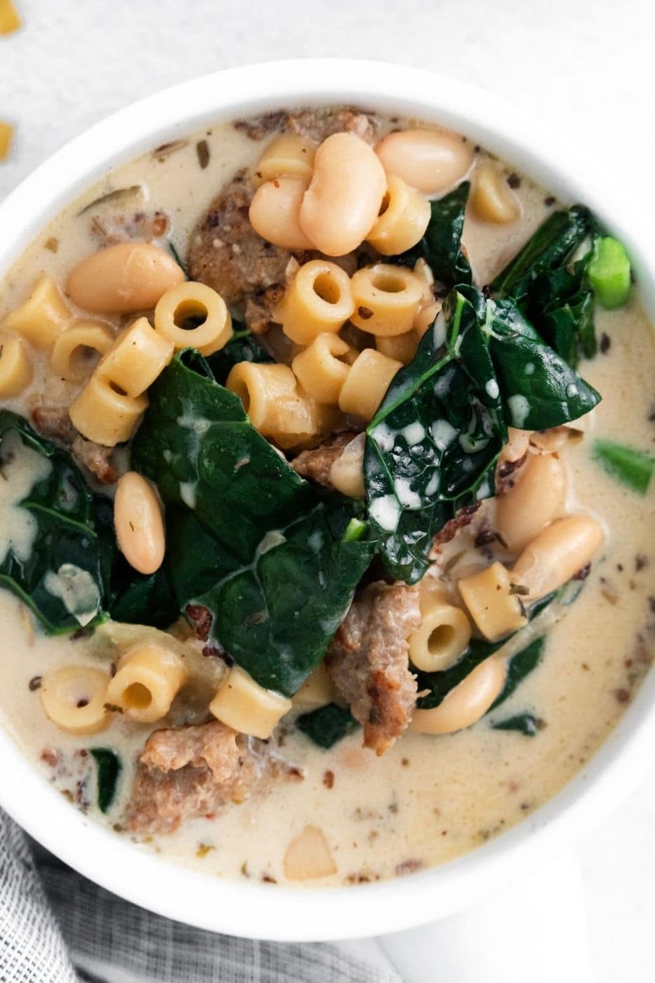 olive garden copycat soup in a white bowl on table 