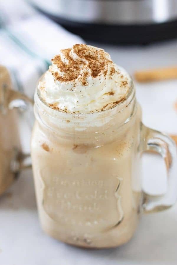 pumpkin coffee with whipped cream on top