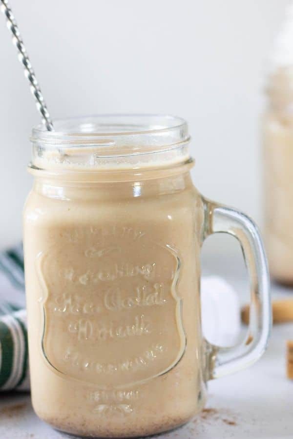 pumpkin spice hot coffee with spoon in it