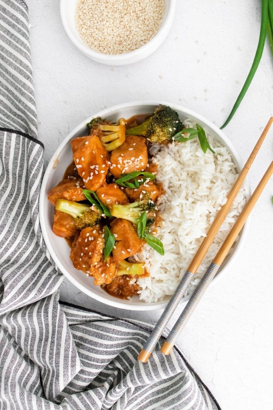 instant pot chinese chicken in a bowl with chopsticks by it