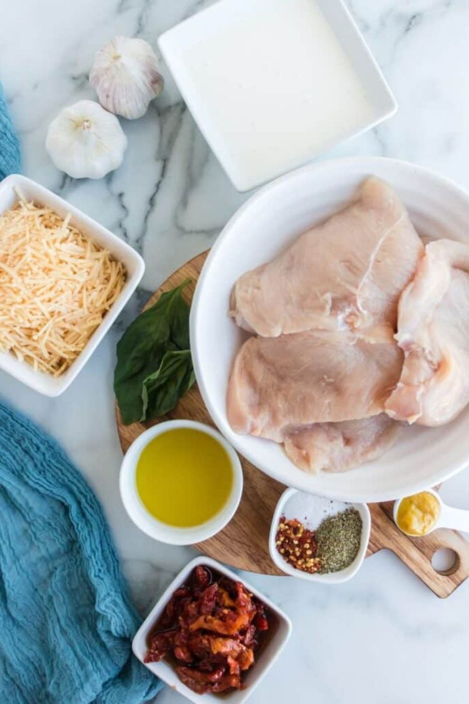 marry me chicken ingredients on a table in single serve containers 