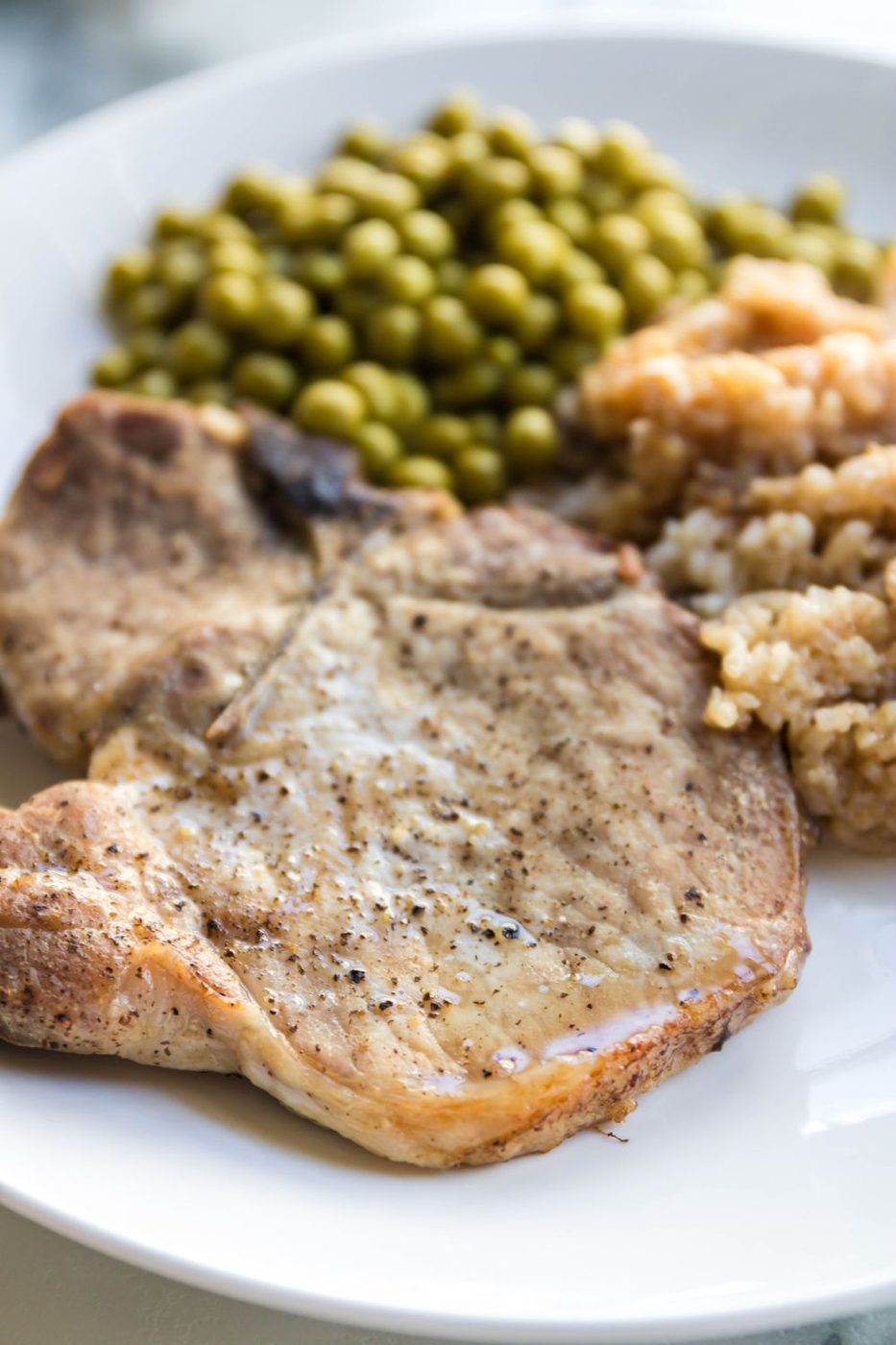Oven baked pork chops and rice in a 9x13 casserole dish