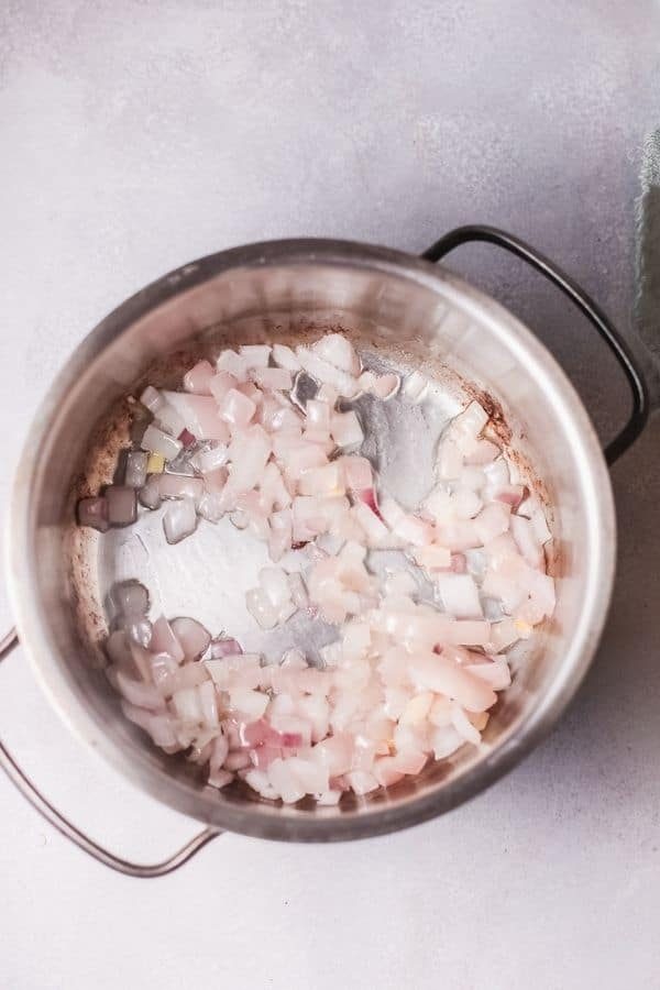 onions and garlic in a pot 