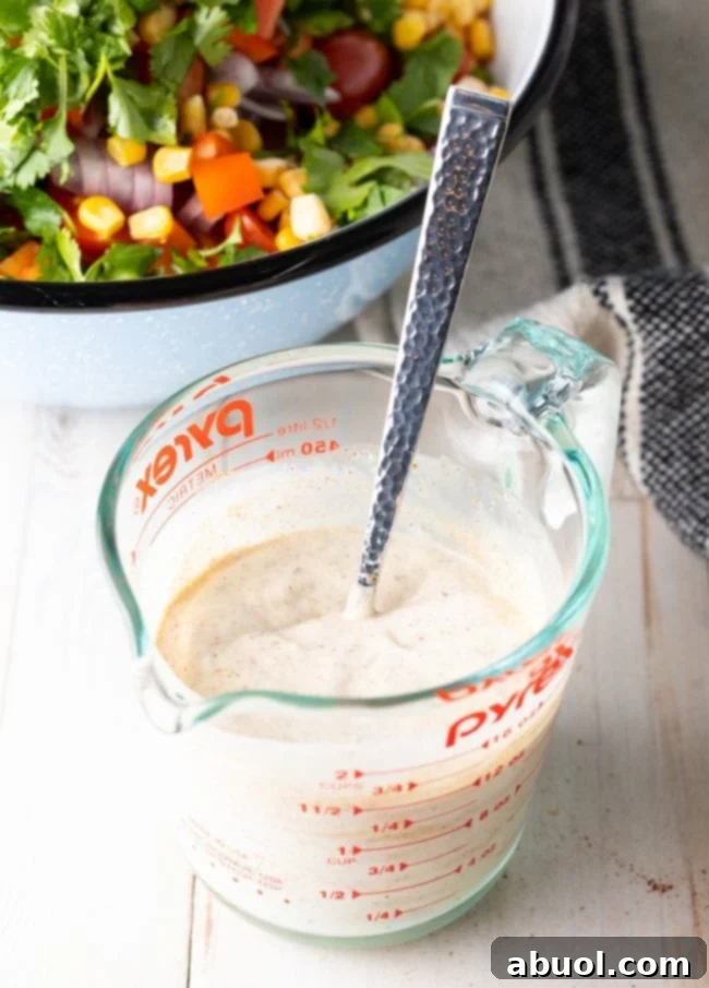 Close-up of creamy southwest ranch dressing in a bowl.