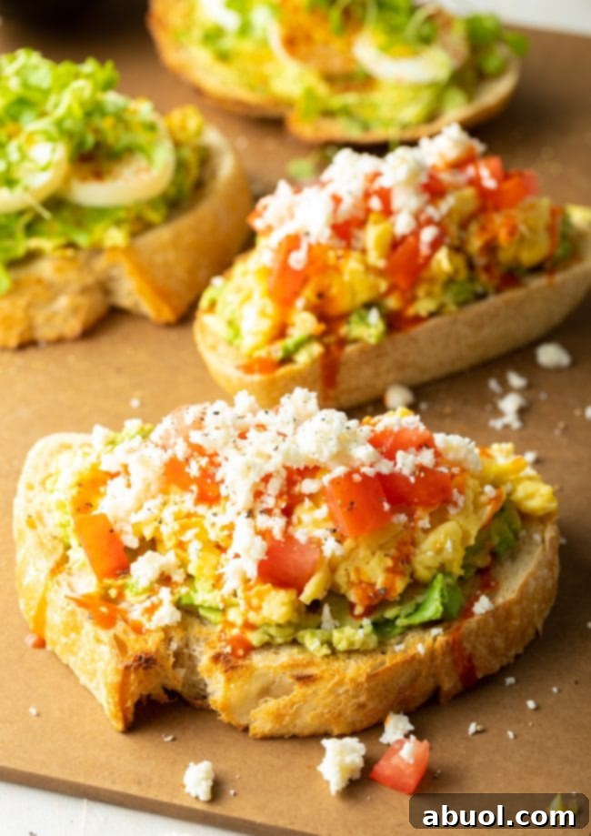 The Perfect Avocado Toast with Egg 2 avocado toast with egg, topped with microgreens