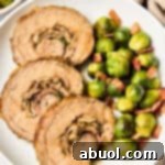 Amazing Stuffed Flank Steak Recipe with Prosciutto and Mushrooms on plate