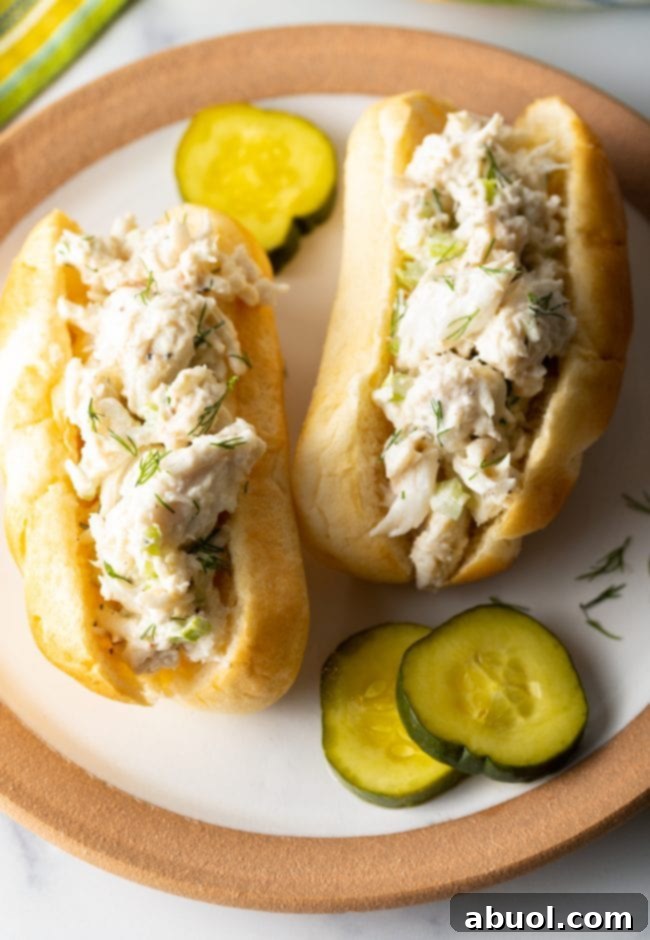 sandwiches made with seafood in a creamy dressing