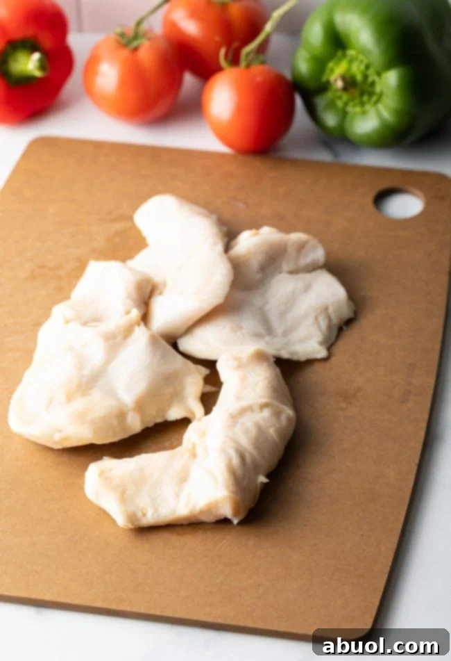 fresh conch steaks on cutting board, ready for preparation