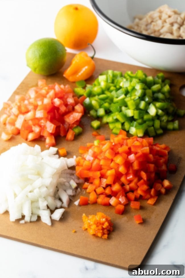 Diced onion, tomatoes, and peppers, showcasing the colorful vegetables