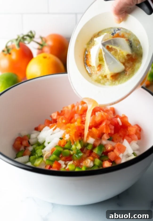 adding citrus juice to conch salad, illustrating the key curing step