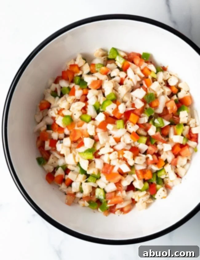 bowl of raw seafood salad with Bahamian food ingredients, ready to be served
