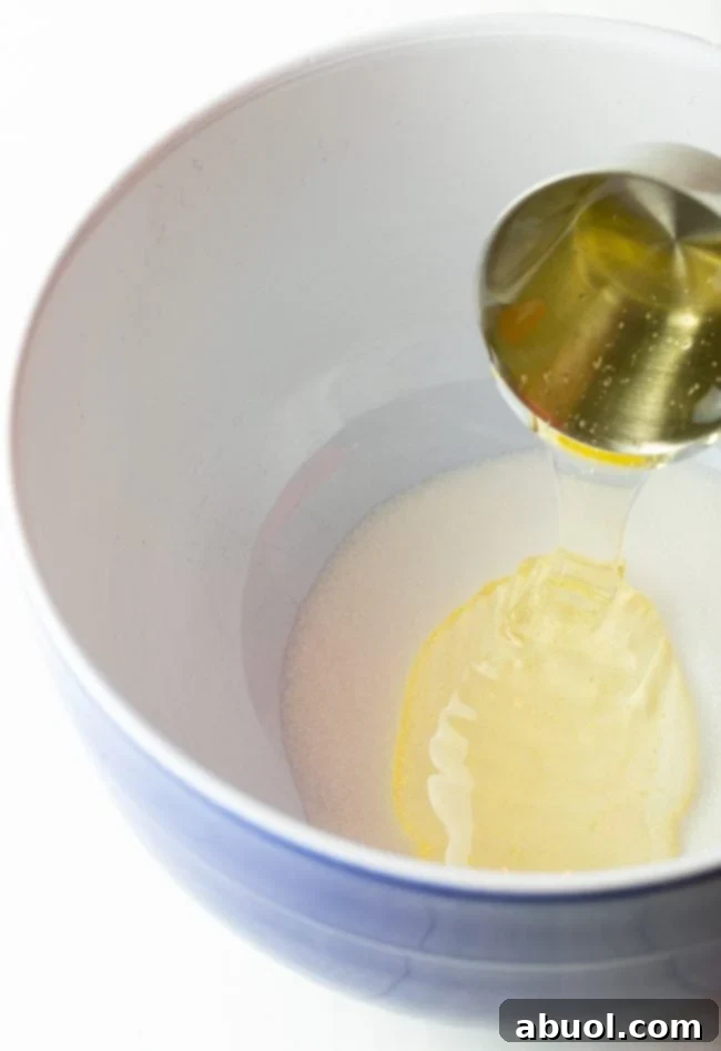mixing corn syrup with sugar