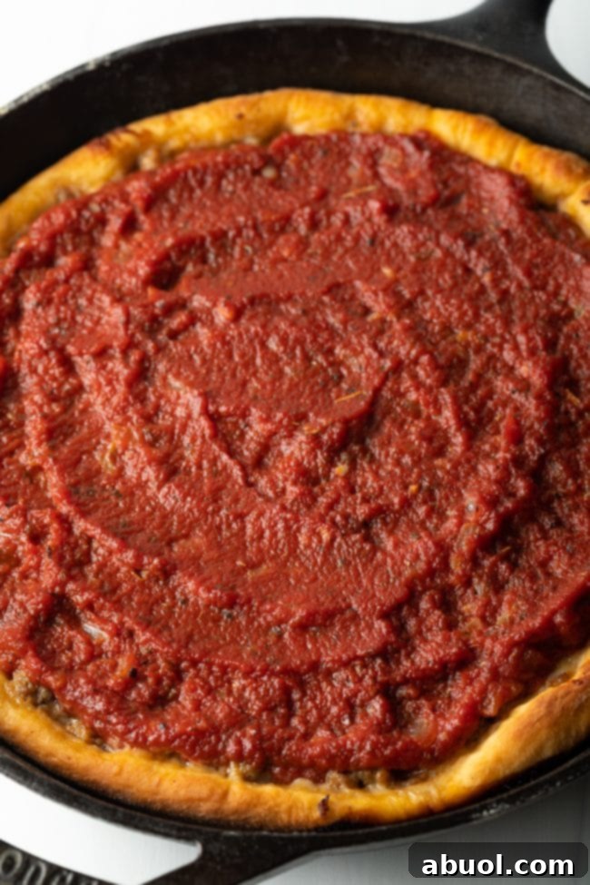 top view baked pizza with tomato sauce