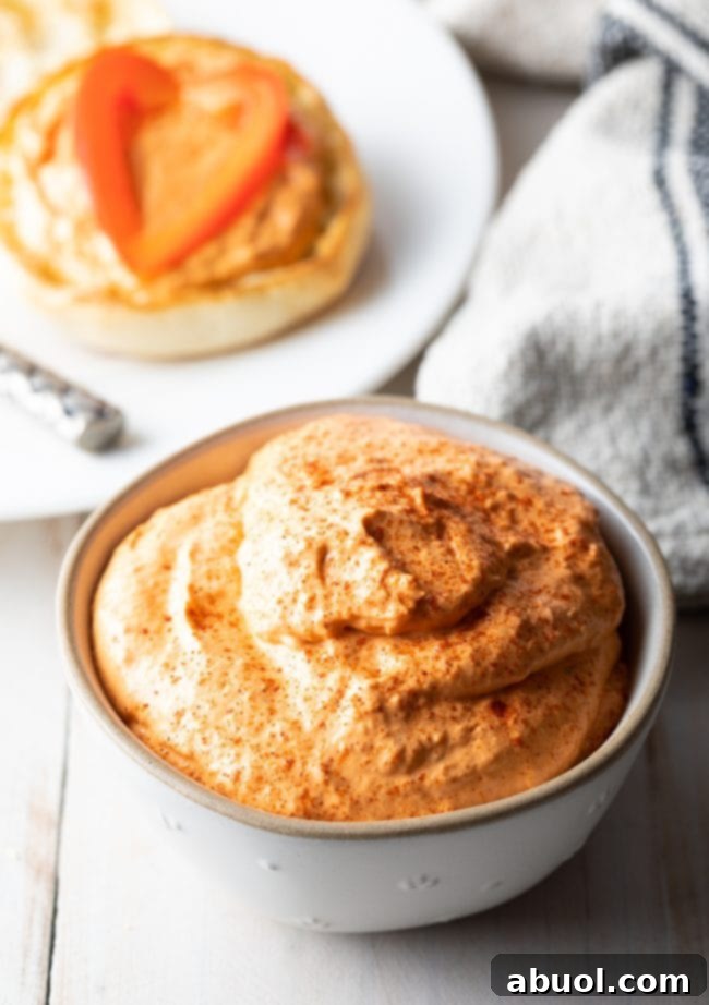 No-Cook Red Pepper dip served in a small bowl. 