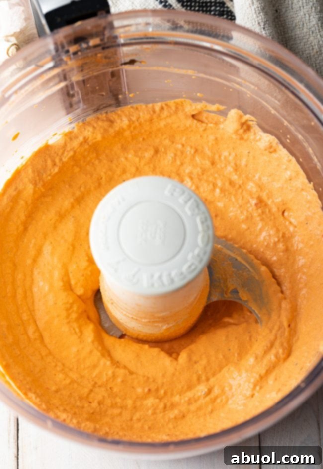 Roasted red pepper sauce in a food processor. 