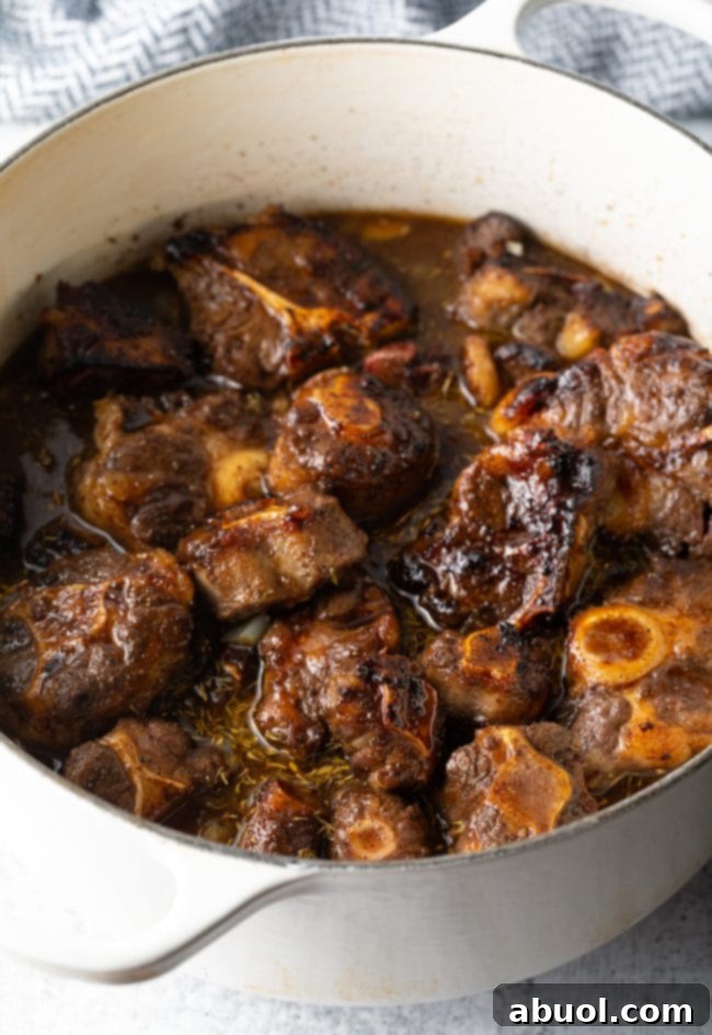 Slow cooked oxtail in pot. 