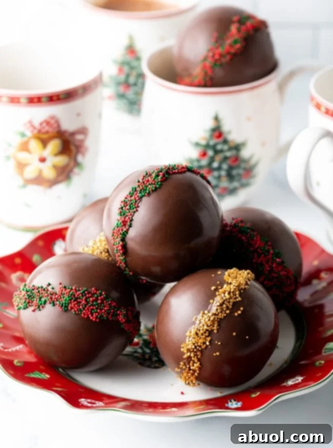 Velvet Cocoa Spheres 2 Stocked hot chocolate bombs on a plate.