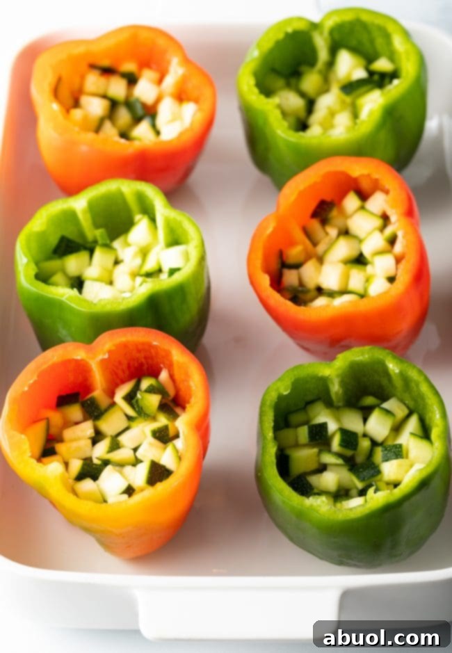 Bell peppers loaded with diced zucchini.