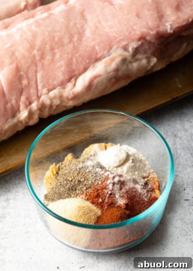 Ultimate Smoked Pork Loin Rub 5 Smoked Pork Loin Rub - close-up view of the spice blend in a glass dish, ready to be applied