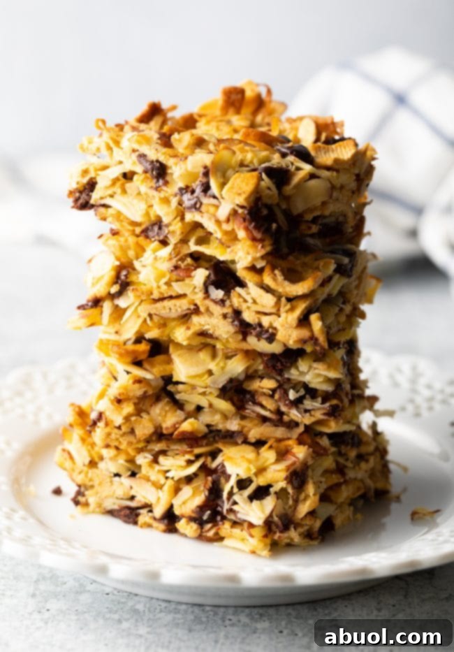 Low Carb Keto Cereal Snack Bars 10 Stack of low carb keto cereal snack bars on a white plate, showcasing their inviting texture.