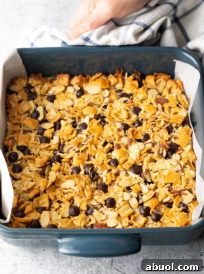 Low Carb Keto Cereal Snack Bars 7 Top view of the baking pan with keto cereal mixture pressed into an even layer, before baking.