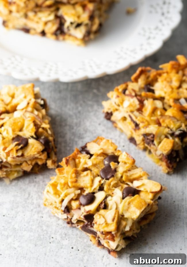 Low Carb Keto Cereal Snack Bars 9 Top view of keto cereal snack bars neatly cut into squares on a cutting board.