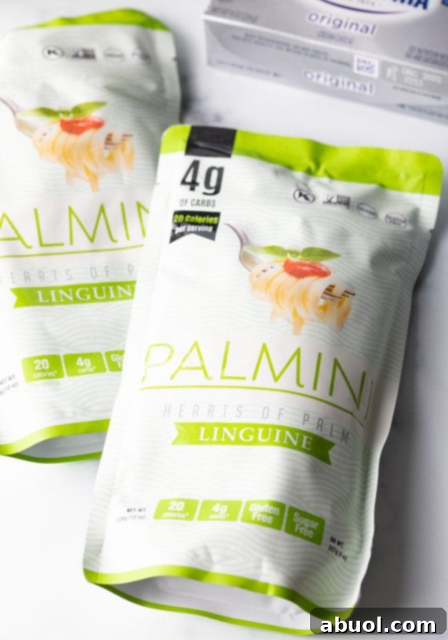 Several packages of gluten-free linguine (hearts of palm pasta) displayed on a white background, highlighting the main ingredient.