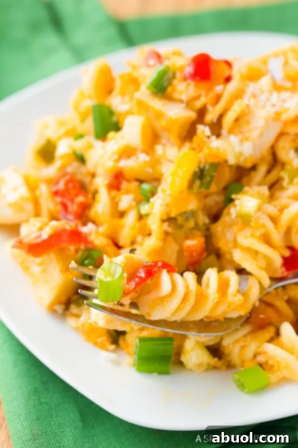 A large serving of Buffalo Chicken Mac and Cheese, perfect for sharing or meal prepping.