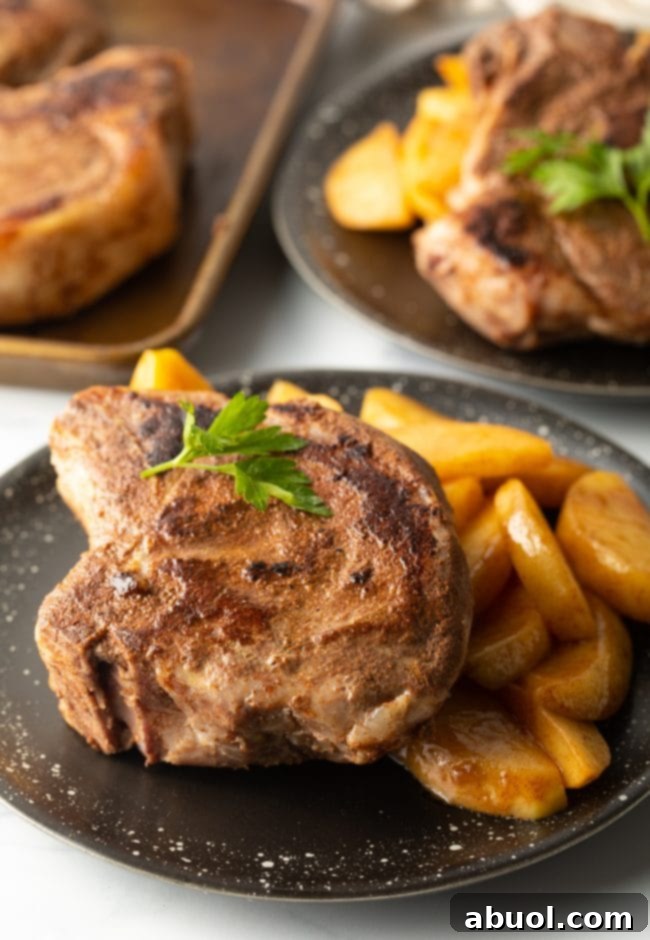 sous vide boneless pork chops or bone in chops on plate