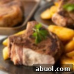 cut shot showing juicy inside of sous vide pork chop