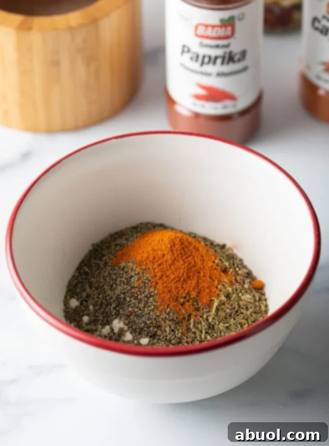 Spices added to a small bowl.