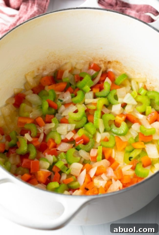 Sauteed veggies in a pot. 