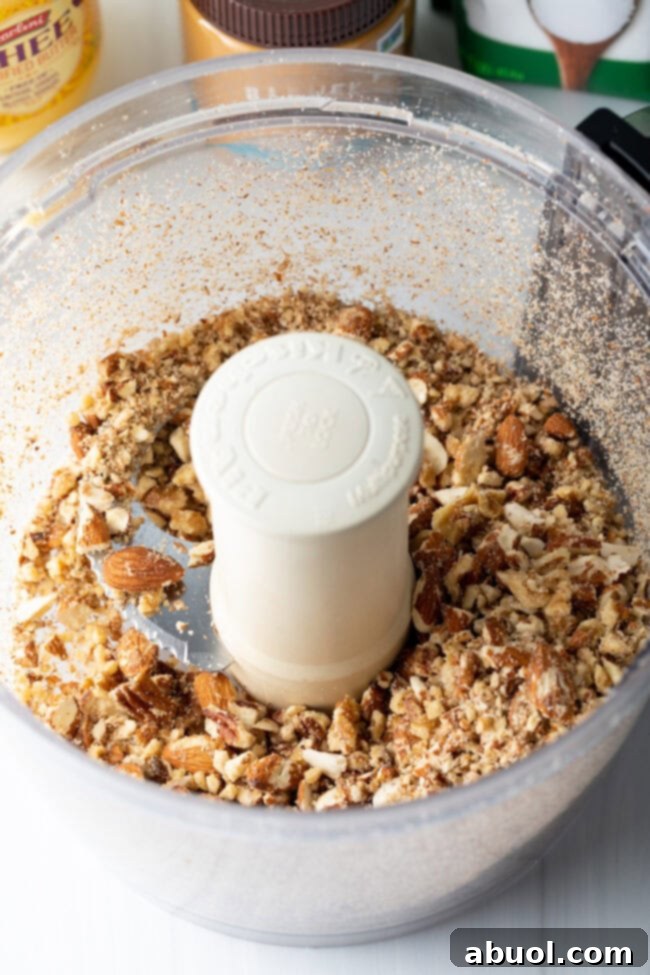 Ultimate Keto Granola Crunch 6 Close up of mixed nuts and seeds in a bowl.