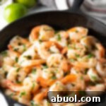 Sauteed Tequila Lime Shrimp in a skillet.