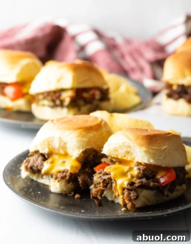 Plate of two philly cheesesteak sliders - Shaved Beef Steak Recipe