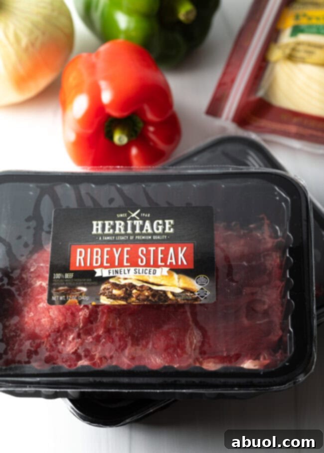 Package of unopened sliced ribeye steak.